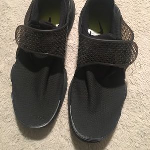 All black Nike sock darts